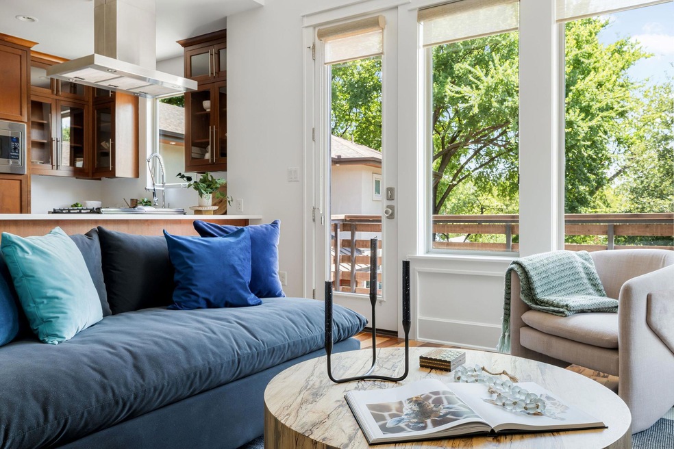 Living room featuring wood finished floors and ba