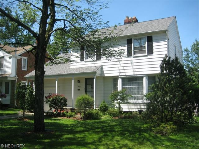 Covered Front Porch greets you at this 4 Bedroom C
