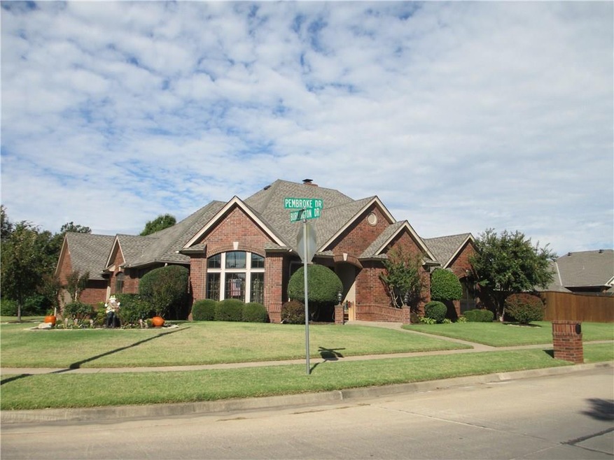 Large corner lot. 2.8 acres. Professional landscap