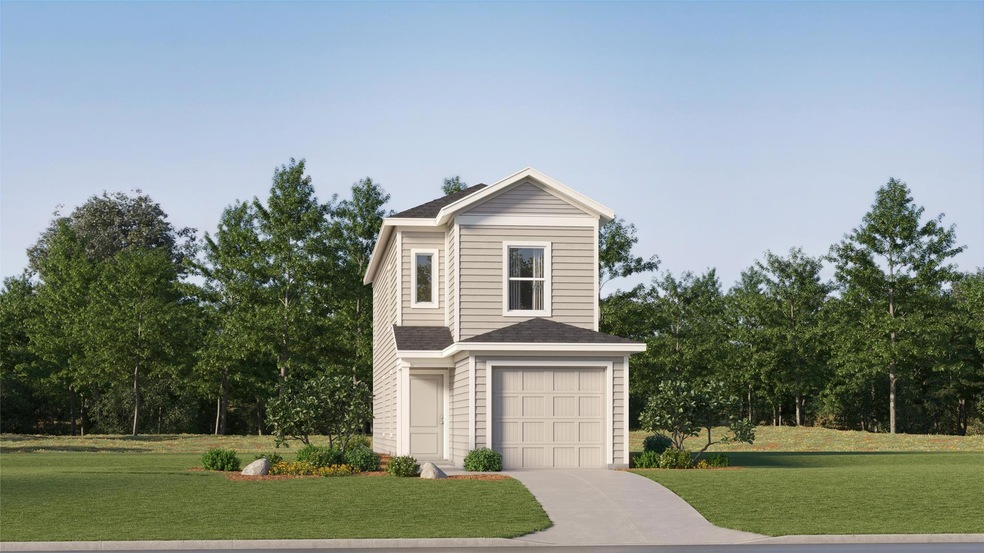 View of front of house featuring a garage and a fr