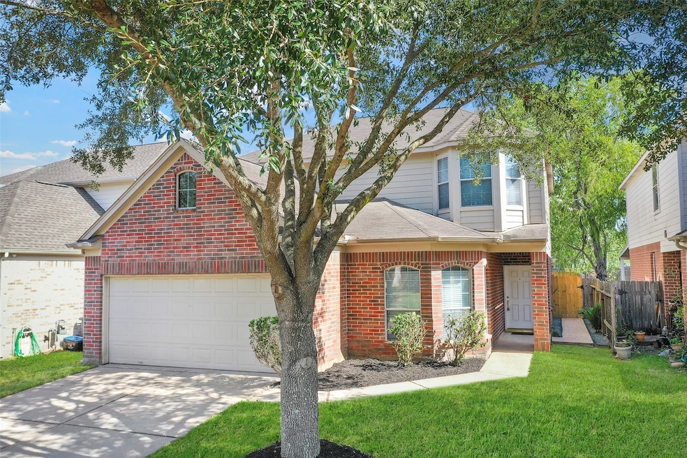 Welcome home to 19326 Camellia Knoll Trail...