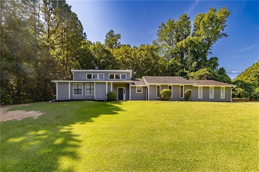 View of front of house with a front yard