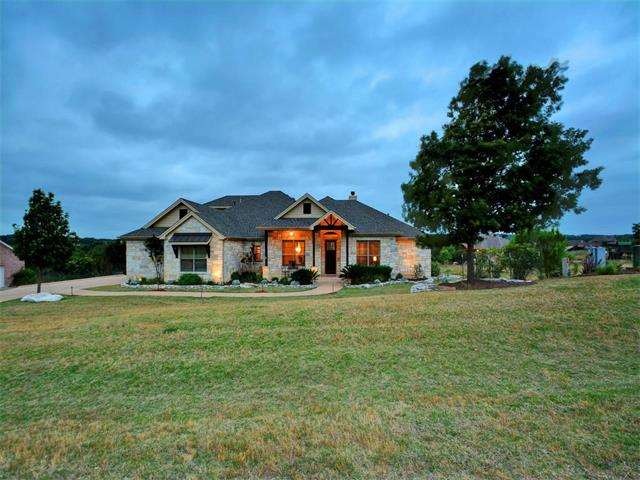 Home is situated on 1.24 acres and backs to greenbelt space.