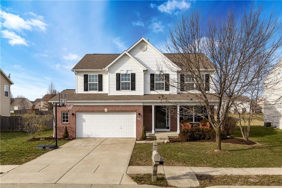 WELCOME HOME - Beautiful front exterior w/charming front porch.  Don't miss the 4' Garage extension!!!
