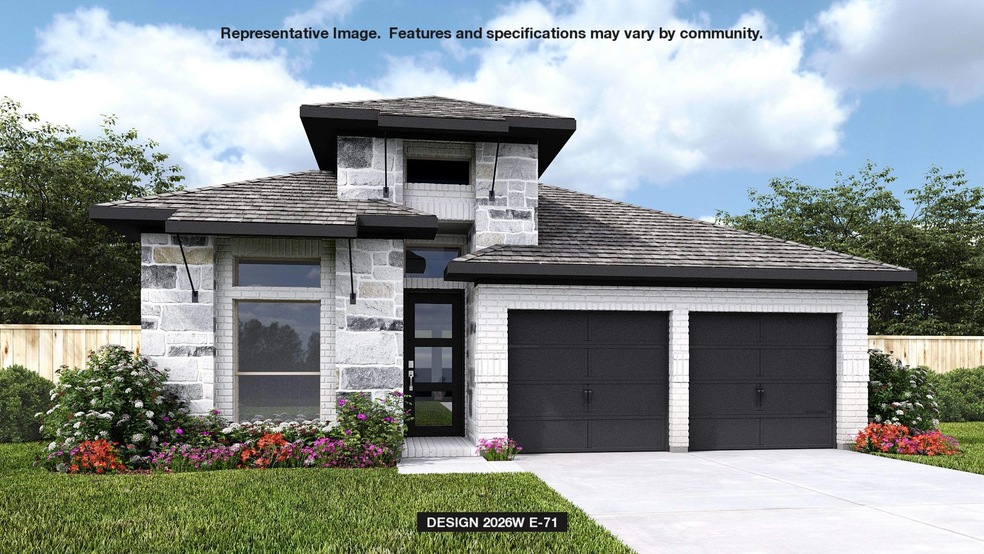 Contemporary home with concrete driveway, a garag