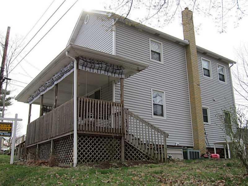 Exterior Front. Great covered porch to enjoy the g