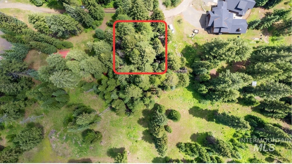 Aerial overview of property's location featuring property boundaries highlighted