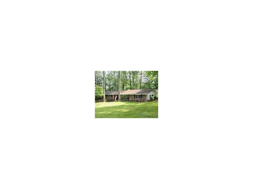 Exterior Front. Brick ranch located on great corne