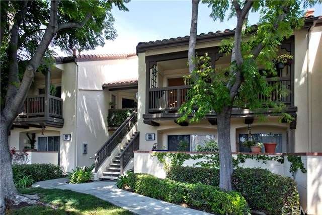 Upper level unit overlooking lush trees and green 