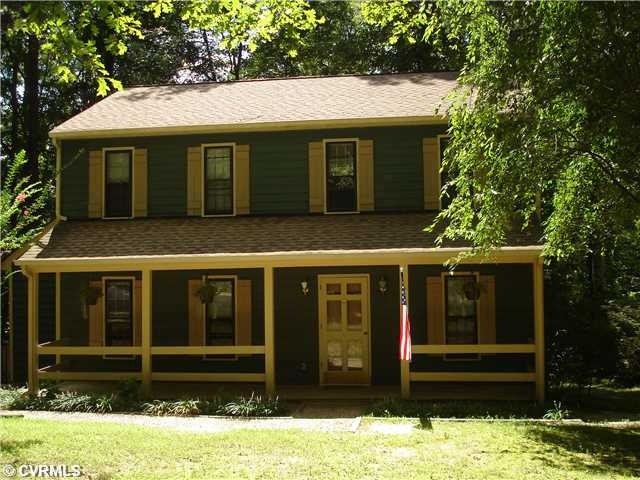 Exterior Front - Home has cedar siding.
