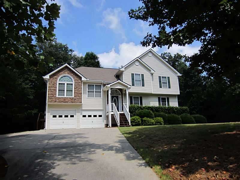 Exterior Front. Beautifully maintained home tucked
