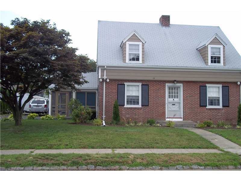Exterior Front. Brick front Cape with screened por