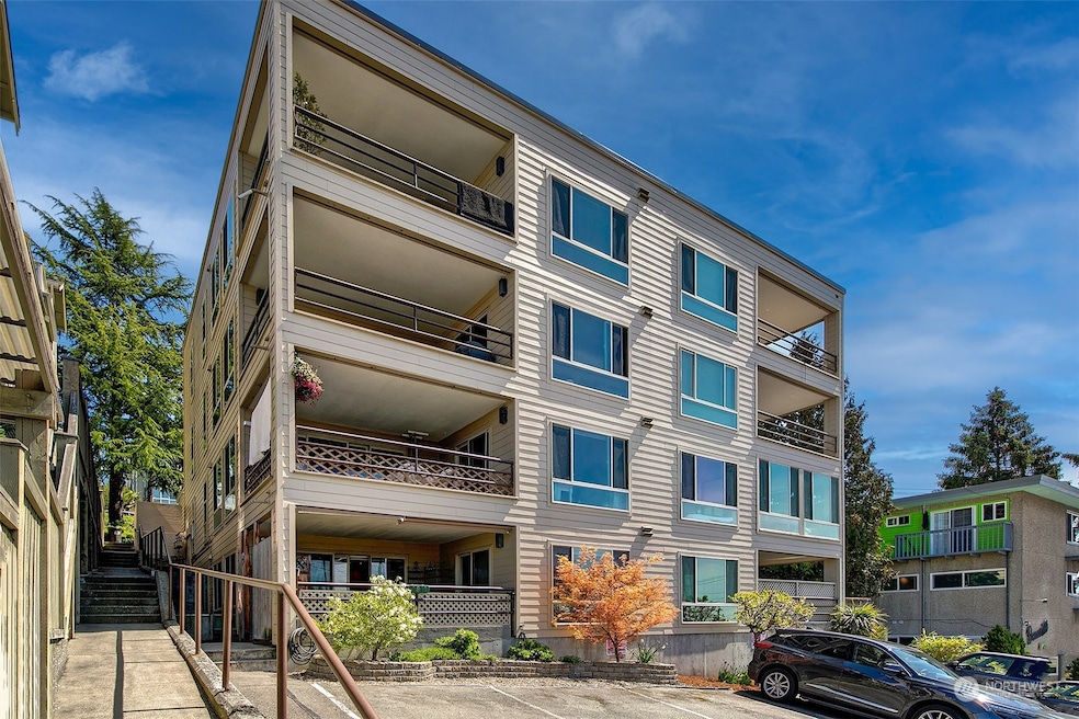 Condo is best accessed from the alley. 2 parking spaces right in front.  The sliders are behind the wooden door  