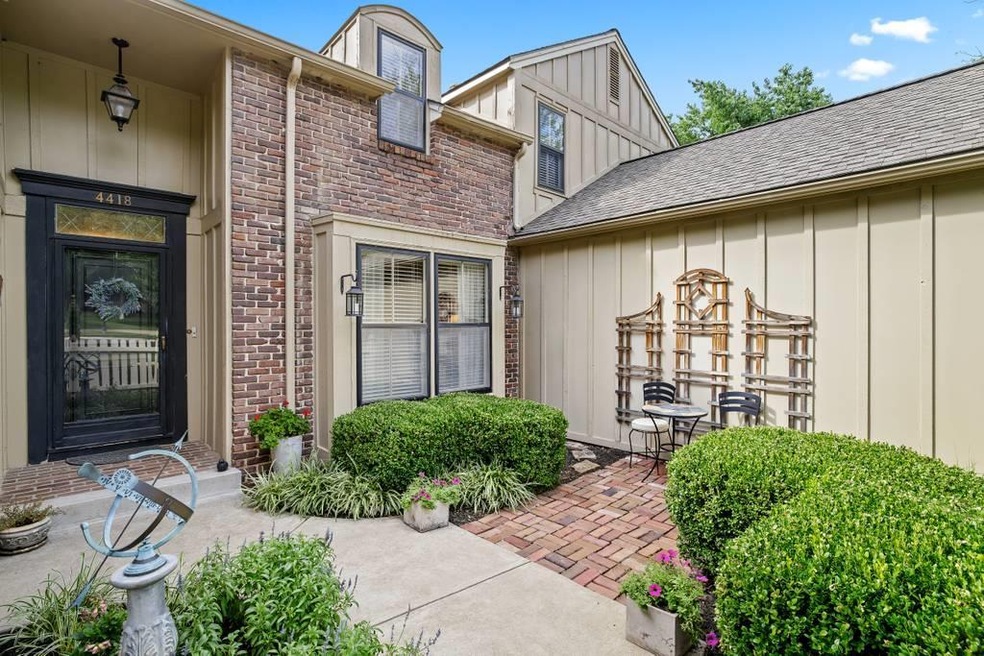Beautifully landscaped courtyard leading to the fr