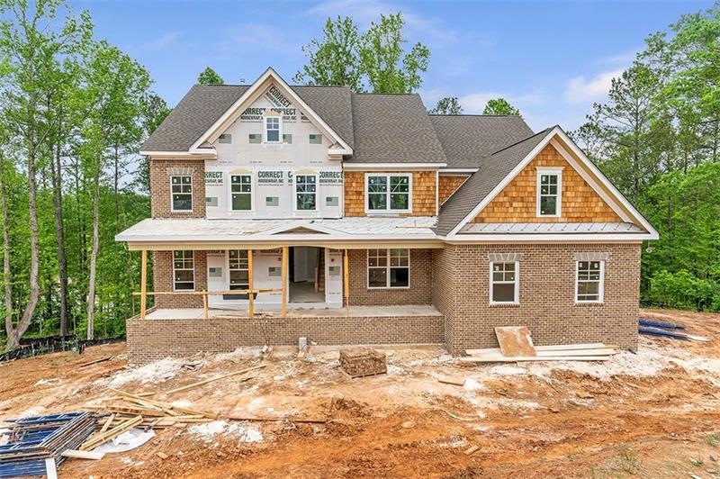 Front of home. Stone work will complete the center