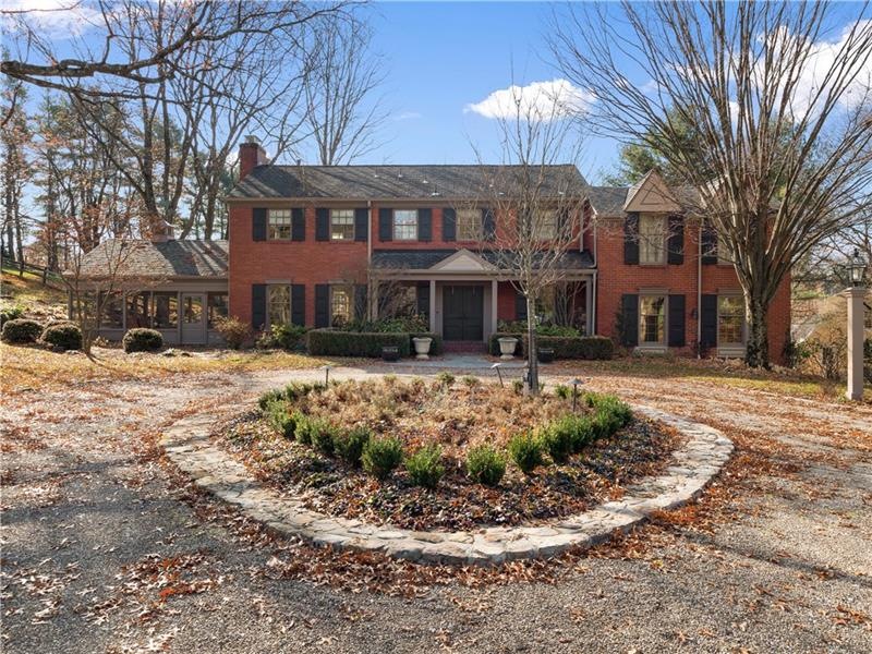 Enjoy this picture perfect brick colonial home on 