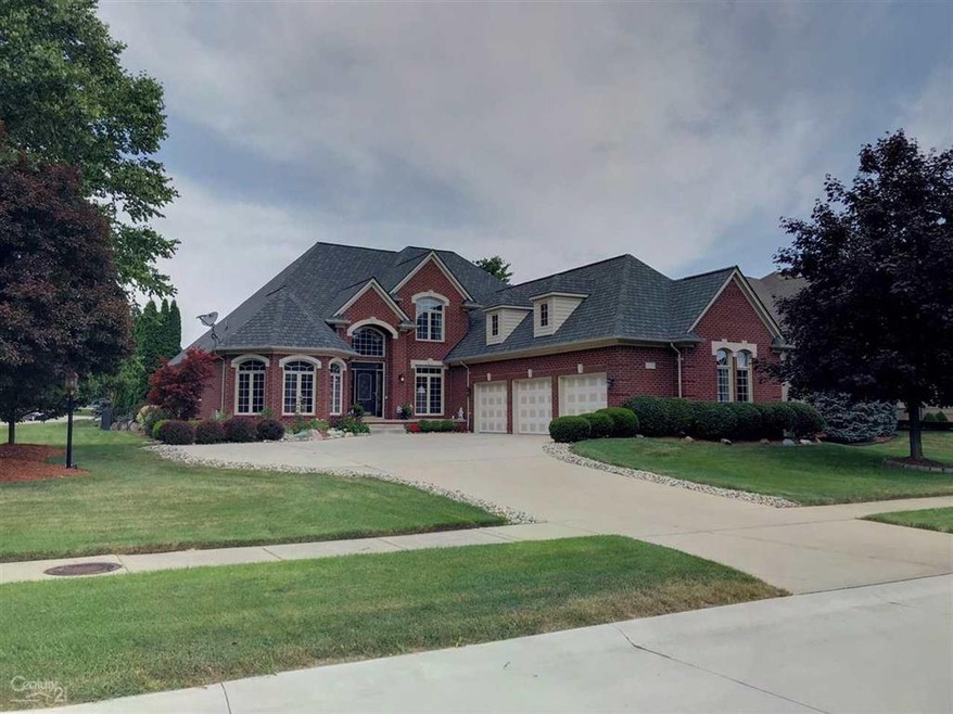 62763 Broadmoor Cir, Washington, MI 48094 - photo 1