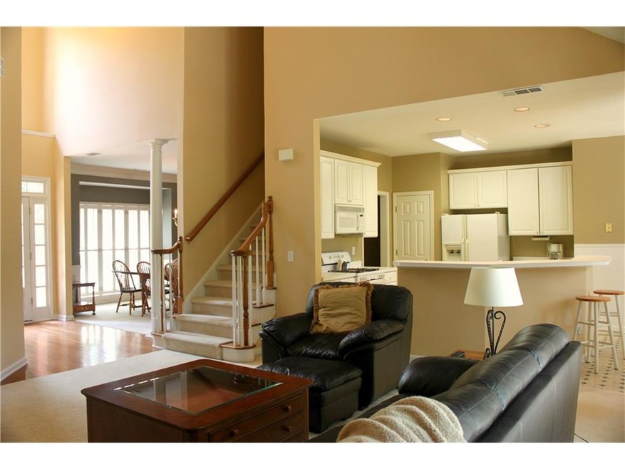 Spacious open floor plan with neutral decor.