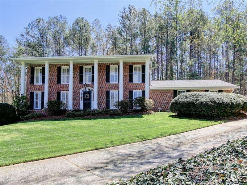 Stately brick home with beautiful curb appeal.