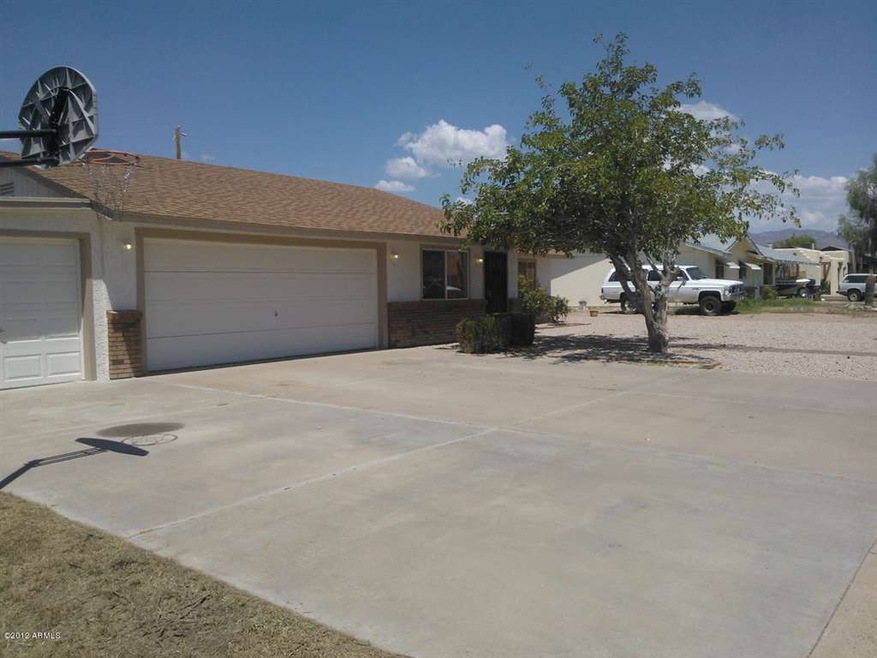 3 car garage and room to play!