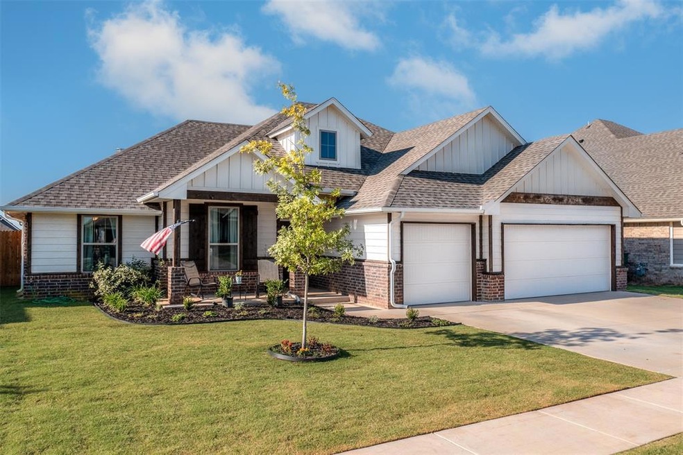 Craftsman inspired home with a front yard