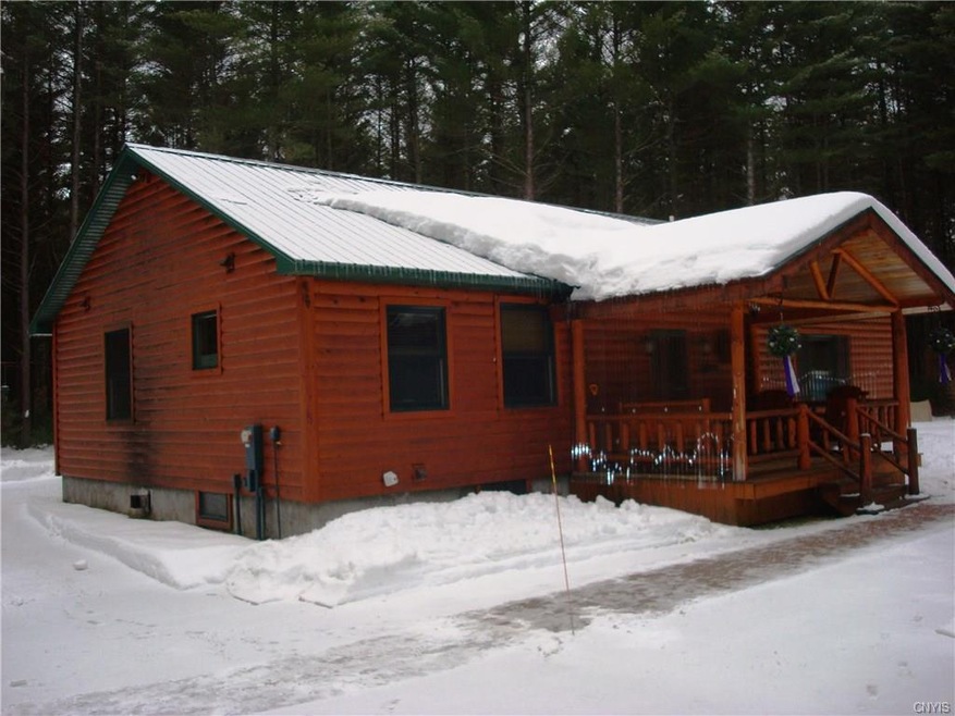 Log sided home with 25 acres and so much to offer.