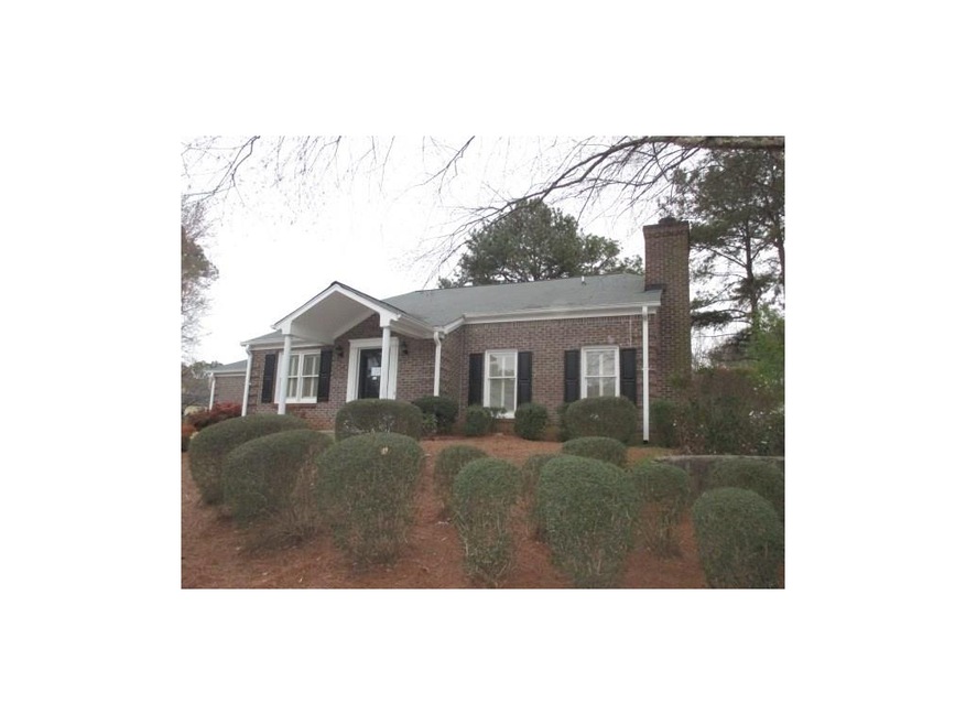 FRONT VIEW, LOTS OF LANDSCAPING. HOA DOES ALL EXTE