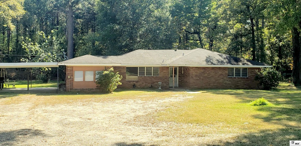 12426 Crossett Rd, Bastrop, LA 71220 - photo 1