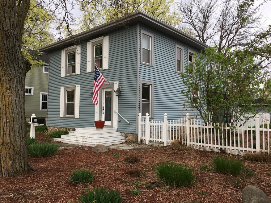 214 N Hudson St SE, Lowell, MI 49331 - photo 1