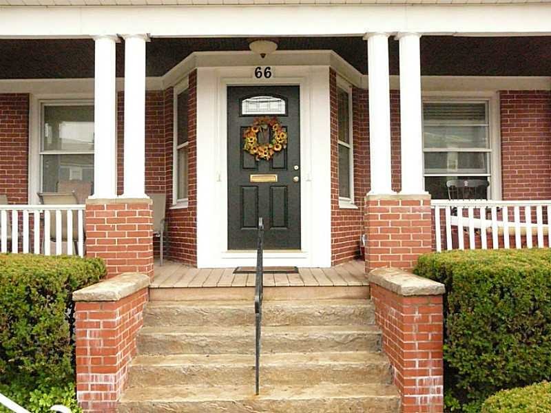 Exterior Front. Gracious front entry to common int