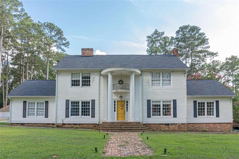 Southern style home surrounded by 17 acres.