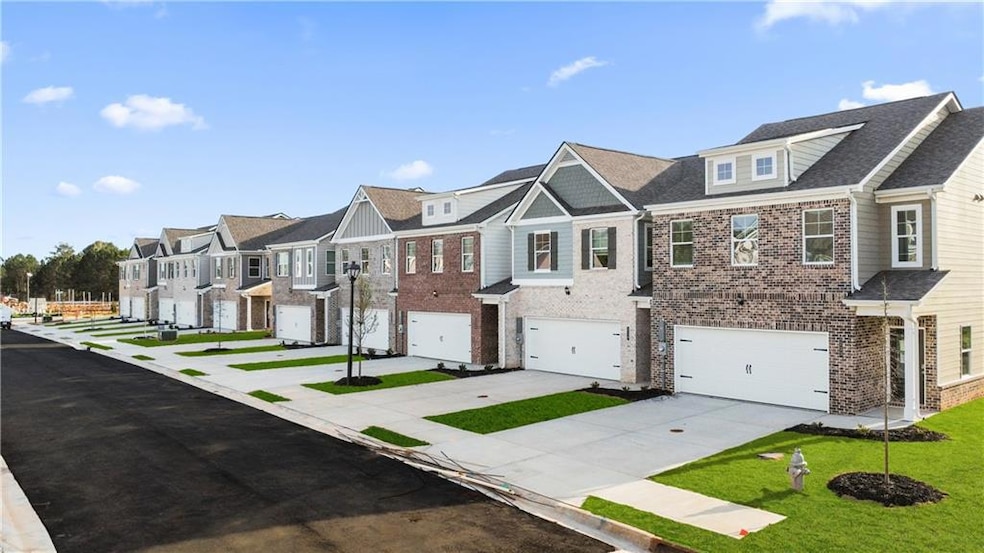 View of front of property with concrete driveway, 