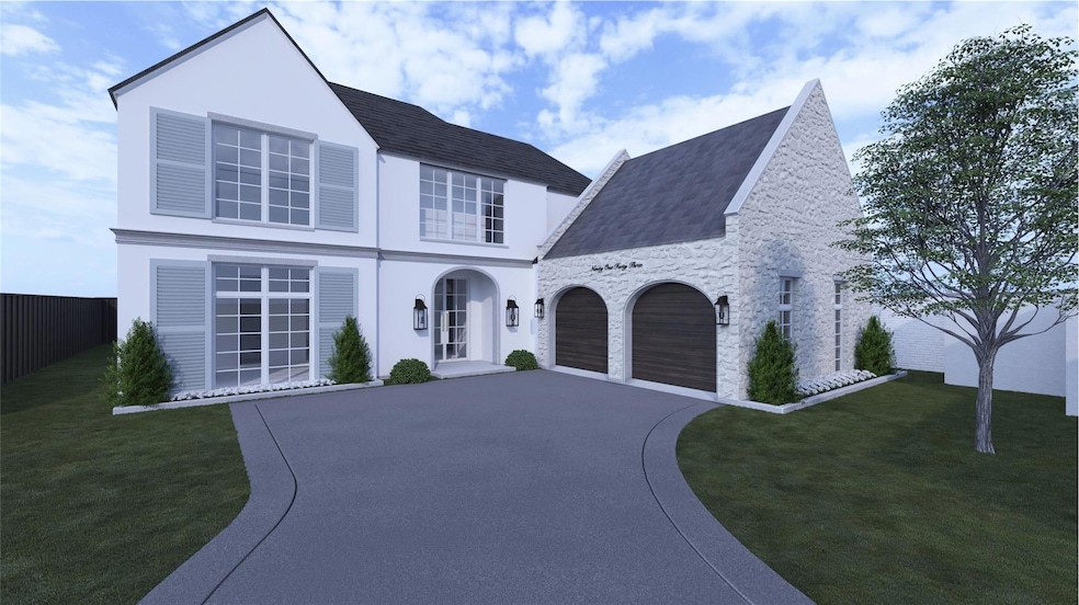View of front facade with a front yard, an attache