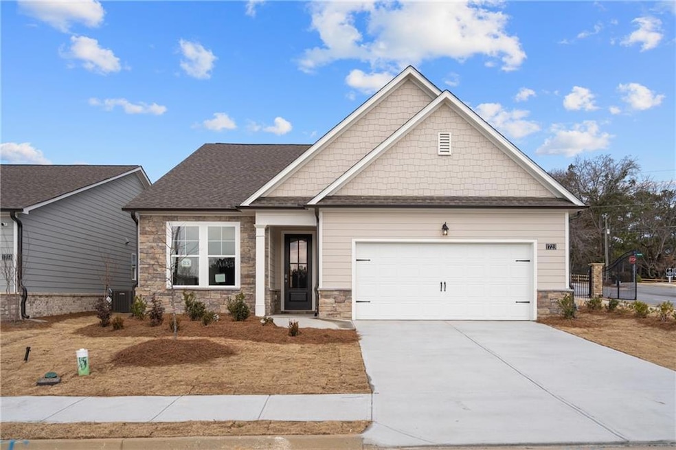 Craftsman-style home featuring cooling unit and a 