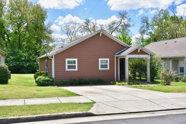 3289 Rainwood Drive. Established flower beds are ready for your green thumb. 