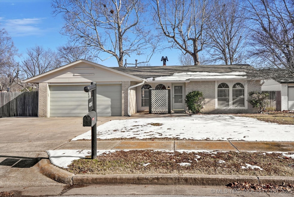 Wonderful brick exterior and oversized garage, wit