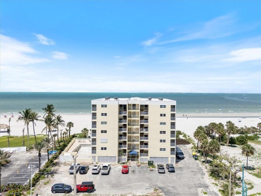 100 Estero BLVD #633_Drone / aerial view of apartment complex / building and expansive coastline