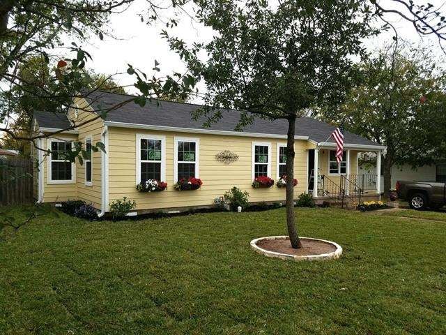 Spacious front and back yards with original porch 