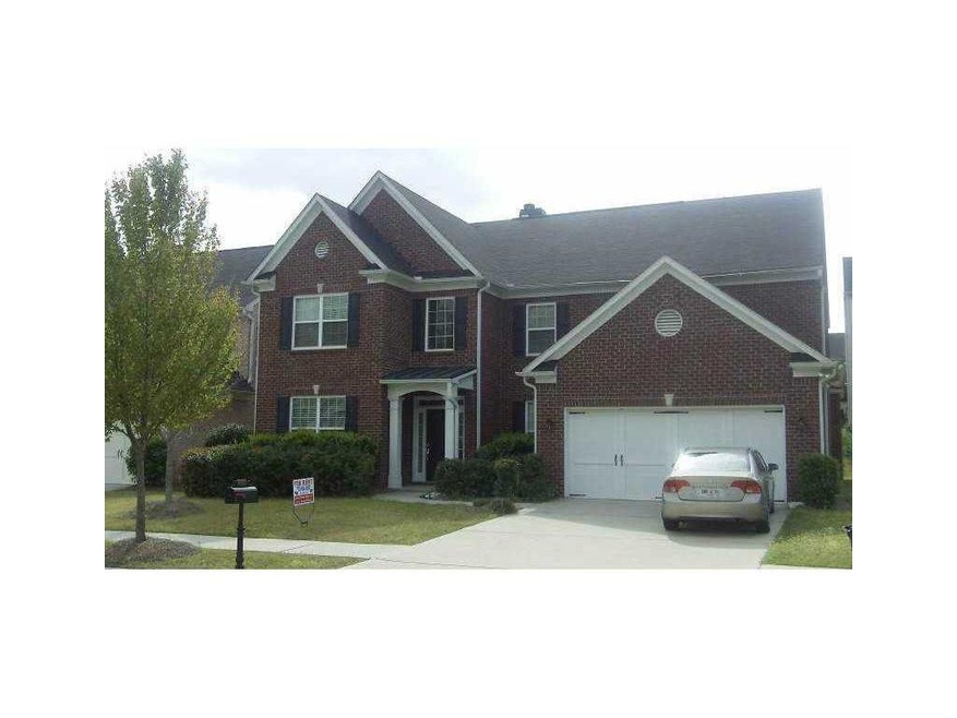 Exterior Front. 3 SIDED BRICK, Level Driveway and 