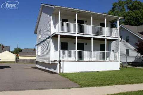 702 N Chevrolet Ave, Flint, MI 48504 - photo 1