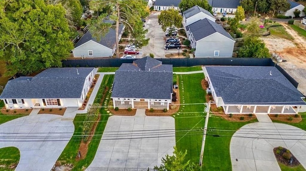 Birds eye view of property with a residential view