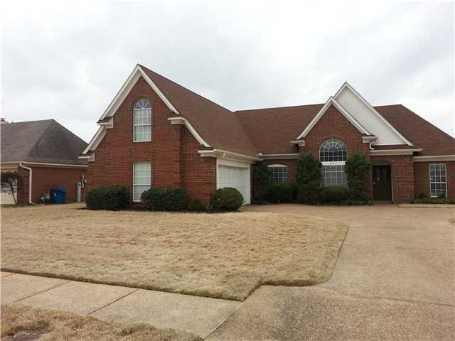 Side load garage with extra parking pad!