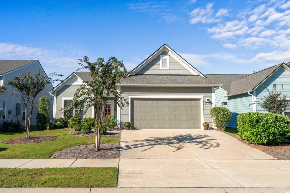 View of front of home with a garage