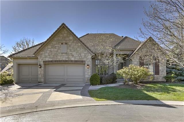 Amazing curb appeal with stone accent and title ro