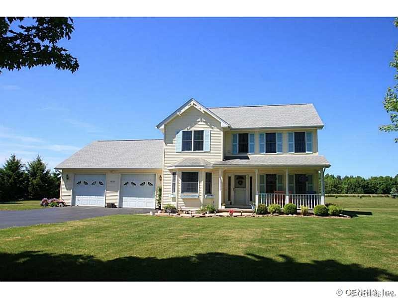 Exterior Front. This home sits atop a gentle knoll