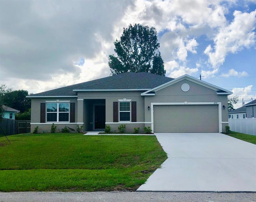 4250 SW Utterback St, Port Saint Lucie, FL 34953 - photo 1