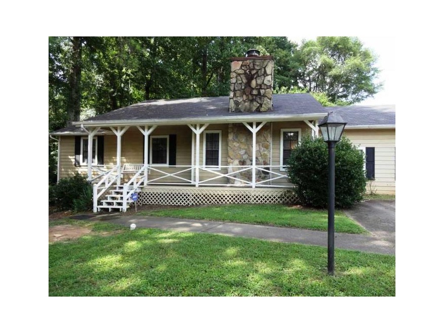 Exterior Front. Adorable Home in Wooded Surroundin