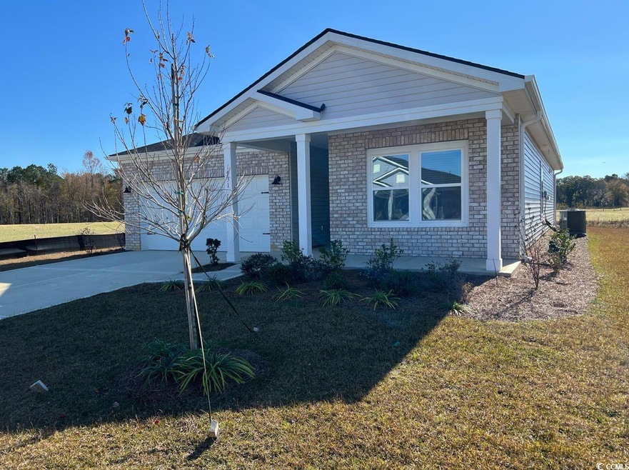 View of front of property with a front lawn and a 