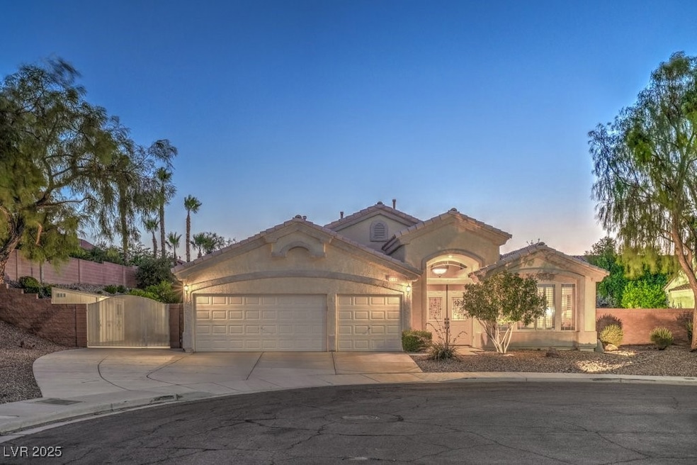 Mediterranean / spanish house with driveway, an at