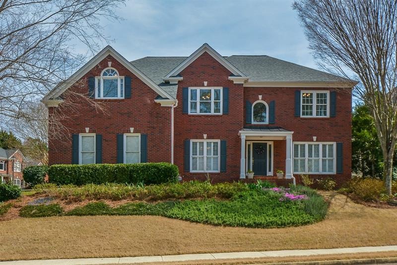 Front View of home with covered porch and side ent